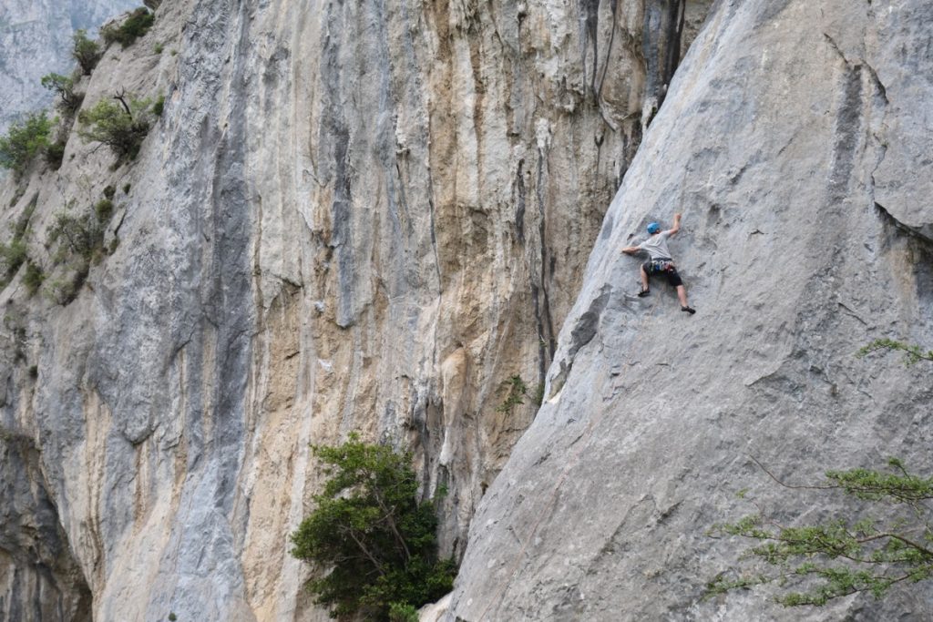 Josh Douglas climbing the technical Espolon Tima Turner 6b at Rumenes. Hermida Gorge, Picos Du Europa