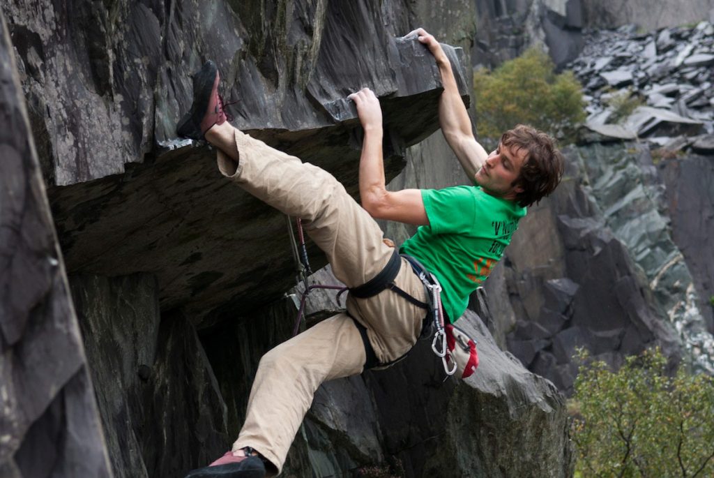 Finally a roof on slate rather than one made of Slate! pete Robin eases his way across Truffle Hunters Roof, F6c.