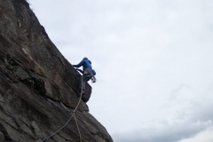 Simon Lake climbing the Merlin Super Indirect Variation at Tremadog. A fine and exposed HVS/E1.