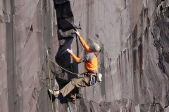 Jack Geldard wrestles with the incredible Drowning Man on the Rainbow Wall area of the Dinorwic slate quarries.