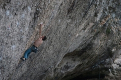 Tommy Chamming working The Empire State on the Diamond, 8a.