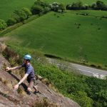 Climbing the classic Boo Boo at Tremadog on one of our rock climbing courses