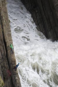Jesse King climbing Shangri-La, a classic Severe at Baggy Point in North Devon. A route we managed to sneak in between a storm and the rising tide.