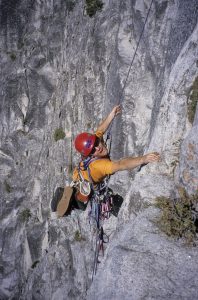Snowdonia Mountain Guides owner Mark Reeves making a pendulum on the Classic NW Face of Half Dome, Yosemite, back in 2001.