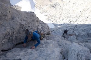 Jesse King climbing the third ptich of the South Face of the Naranga Dek Bulnes whilst having some lead climb coaching.