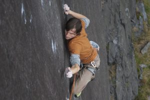 Pete Robins focusing hard as he attempts the Very Big and the Very Small, a 8b+ slab on Rainbow Slab!