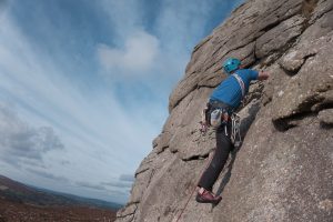 Josh Douglas topping out on Levitation, Haytor Rocks