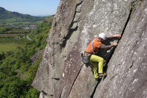 A client commits to the final lay backing section on the corner of Scratch, tremadog
