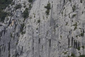A climber in action on one of the long 6c on La Piramide, Ramales.